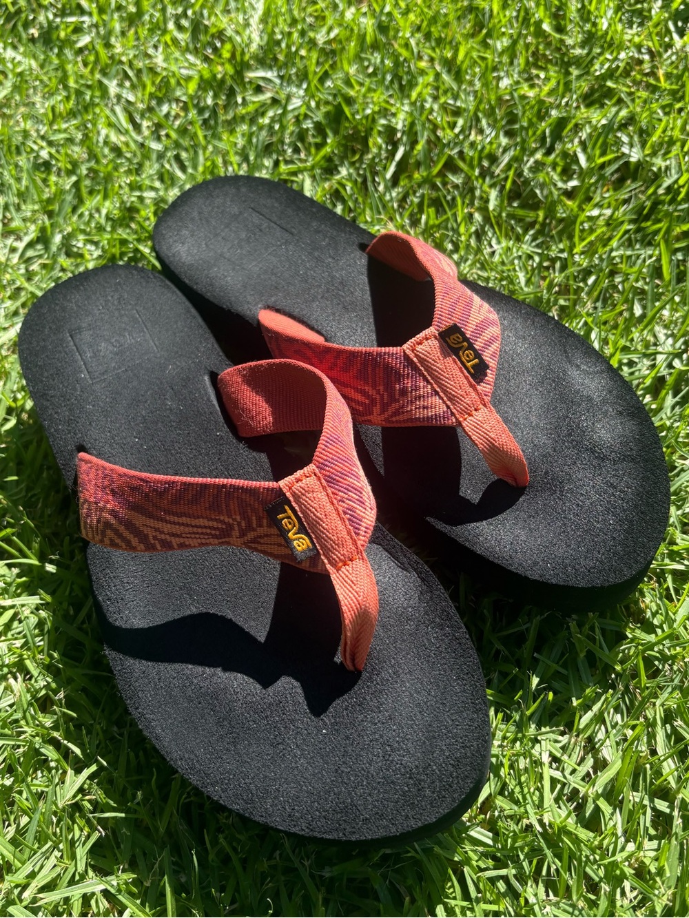 Teva Black Footbed Sandals with Orange Straps